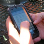 Brenda Knox takes notes on her iPhone. Photo/Kathryn Reed