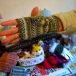 Jonnie Crawford designs knit fingerless gloves.
