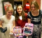 Kelsey Buckley, 8, Makenzie McMillen, 10, and McKenna Brewer, 10, show the diabetes medical kits they take with them almost everywhere.