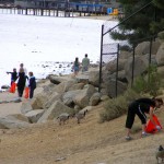 El Dorado Beach pic Residents clear trash from El Dorado Beach on Saturday. Photo/Clean Tahoe