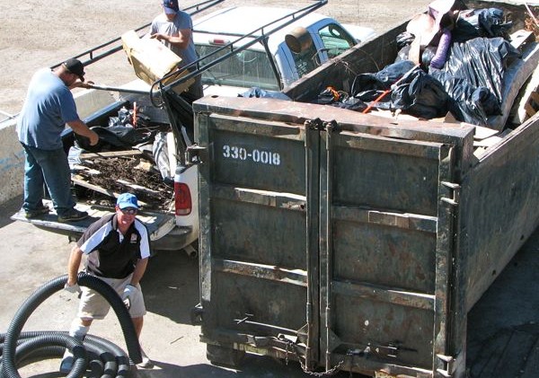 Heavenly workers clear neighborhood of trash