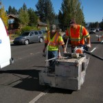 caltrans Michael Flashner and Miguel Padilla stipe Highway 50. Photo/Kathryn Reed