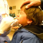 Alex Michalak, 3, isn't thrilled to receive the H1N1 vaccine. Photo/Kathryn Reed