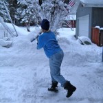 shovel Sue Wood makes shoveling look like a dance move Sunday morning. Photo/Kathryn Reed