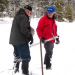 snow survey John Deam and Frank Gehrke measure the water content. Photo/LTN file