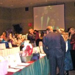 sorop People scour the silent auction tables March 27. Photo/Kathryn Reed