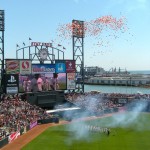 fol-5 San Francisco Giants run onto the field opening day, April 9.