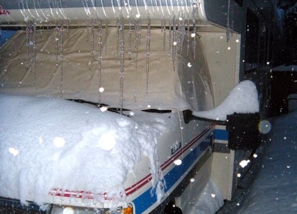 Snow piling up; spring may return mid-week