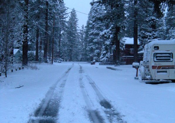 Snow covers Lake Tahoe; sun will return Saturday