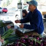 Javier Toscano sells produce at the June 1 farmers' market in South Lake Tahoe. Photo/Kathryn Reed