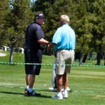 Brian Baumgartner, left,  of NBC’s “The Office” talk with an Edgewood employee on July 13.
