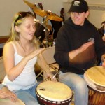 drum Liz Broscoe helps Haley Crowsen with the djembe. Photo/Provided