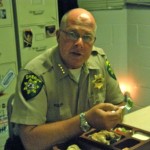 Sheriff Fred Kollar raves about the cream puffs made by inmates at the Tahoe jail. Photos/Kathryn Reed