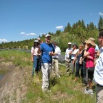 scott Scott Carroll, center, talks about the new river channel behind him. Photo/Kathryn Reed