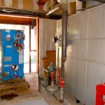 rec-2 The new blue boiler is a fraction of the size of the old white boiler.
