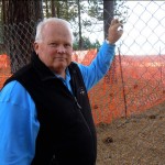 Tom Davis knows the fence at El Dorado Beach, aka Lakeview Commons, is a sore spot with residents. Photo/Kathryn Reed