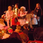 polar-10 Children surround Mrs. Claus as she reads "Polar Express." Photos/Kathryn Reed