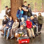 scouts The Scouts enjoy the fruits of their labor as they sit on and show off the bench they built. Photo/Provided