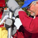 snow survey Frank Gehrke measures the water content at Phillips Station Jan. 28 as Tina Cannon Leahy records the figures. Photo/Kathryn Reed