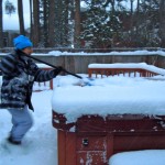 Everyone has to have their shoveling priorities -- like getting access to the hot tub. Photo/Kathryn Reed