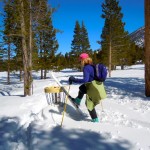 Sue Woods uses the disc golf basket at Bijou to clean her skis. Photos/Kathryn Reed