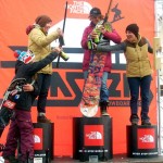 Rosemarie Daiek, from left, Callan Chythlook-Sifsof, Iris Lazzareschi and Maria DeBari enjoy a moment of celebration on the winner's podium. 