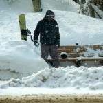 weather A snowboarder waits March 21 for a bus on Highway 50 in South Tahoe. Photo/Kathryn Reed