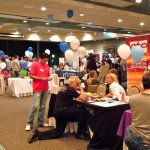 chamber Attendees visit one of nearly 50 booths June 15 in Kings Beach. Photo/LTN
