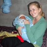 corps baby Brooke Wilkinson holds Jacqueline, one of the babies she witnessed be born. The mom asked Wilkinson to name her child. She did after her mom. Photos/Provided