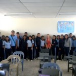 corps group Brooke Wilkinson with a group of adolescents from the community she provided HIV/AIDS education training to.
