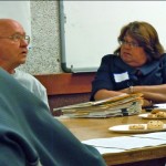 meeting John Upton and Norma Santiago get an earful at the June 16 meeting about rewriting Measure S into Measure R. Photo/Kathryn Reed