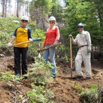 trail builders TRYP members Ashley Hogue and Lyndsay Bryant clearing the trail at Daggett Summit. Photo/Provided