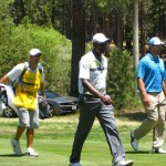 Todd Echan follows Jerry Rice and Aaron Rodgers at the 2010 tournament.