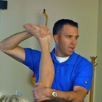 jason collin Physical therapist Jason Collin demonstrates flexibility tests for cyclists. Photo/Kathryn Reed