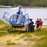 patrol Volunteer backcountry patrollers practice loading a patient into a helicopter. Photo/Provided