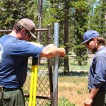 USFS employees install the weather station. Photo/Lisa Herron/USFS