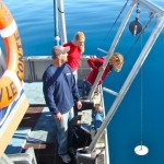 boat The Secchi disc is lowered into Lake Tahoe for one several readings. Photo/Katherine E. Hill