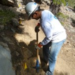 trail work Bill Yee from CA Technologies works the pickmatic to widen the trail. Photo/Provided