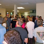 crowd The overflow crows at the Sept. 15 council meeting is directed to the TV in the lobby. Photos/Kathryn Reed