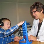 Brayden Blackwell, 6, has his hearing checked by Danielle Knowlton. Photo/Rebecca Wass