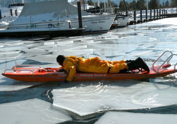 Firefighters ready in case someone falls through ice
