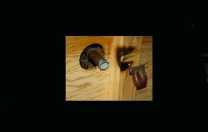 Damage done by copper thieves to a USFS bathroom on the South Shore. Photo/USFS