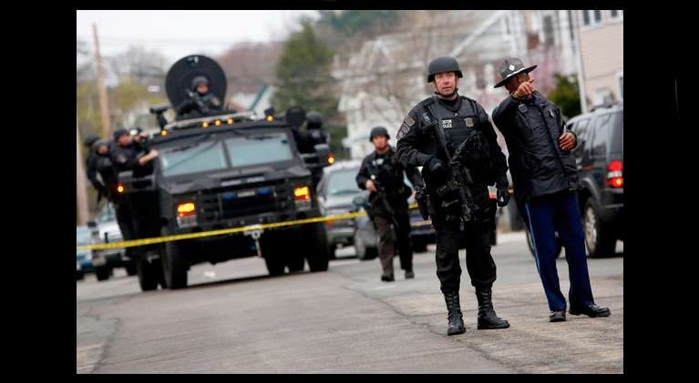 Boston locked down; 1 bombing suspect dead, brother on loose