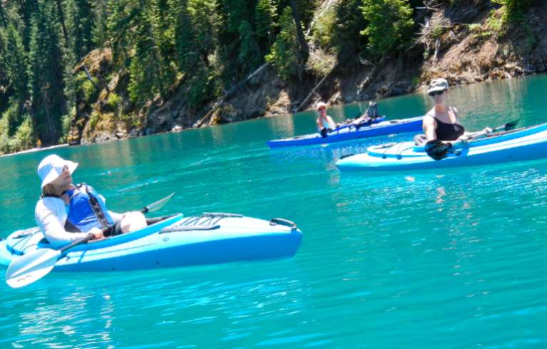 The Reed sisters -- Jann, from left, Pam and Tami -- paddle on the McCloud. Photos/Kathryn Reed