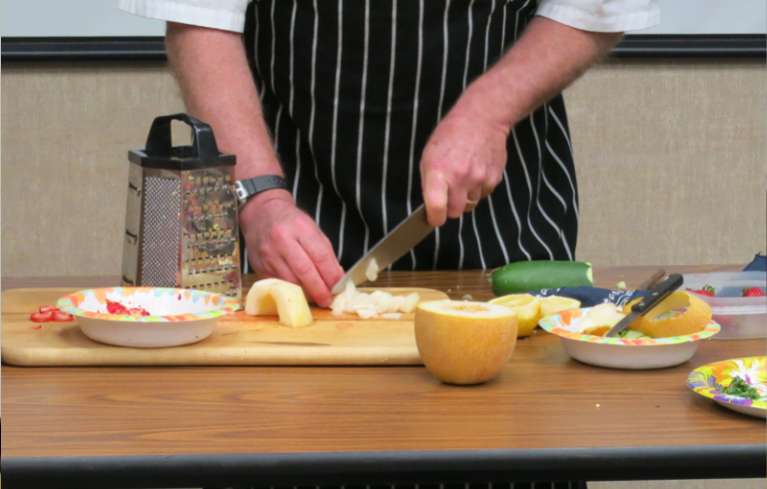 Chef Steve Fernald demonstrates cooking with food from the farmers' market. Photos/Jessie Marchesseau