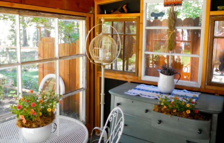 Known as the Tallac Shack because of the view of the mountain, this morning coffee or afternoon wine spot even has flowers in a dresser drawer. Photos/Kathryn Reed