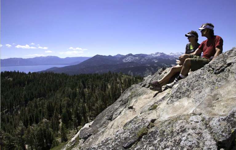 Suzy and Mark take in Lake Tahoe and all the scenery from the false summit of Ellis Peak. Photo/Carolyn E. Wright/Copyright