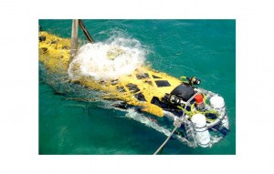 The remotely operated vehicle’s vertical thrusters are tested. Its two lights, high definition video camera and two ballast tanks can be seen at its bow. Photo credit: Ross Powell, NIU