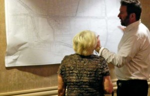 Alfred Knotts with Tahoe Transportation District looks over one of the loop road maps with Angie Watson who owns apartments in the project area. Photo/Kathryn Reed