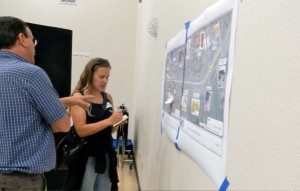 Jennifer Quashnick writes a comment Sept. 11 about the Meyers Area Plan while talking to Lyn Barnett. Photo/Kathryn Reed